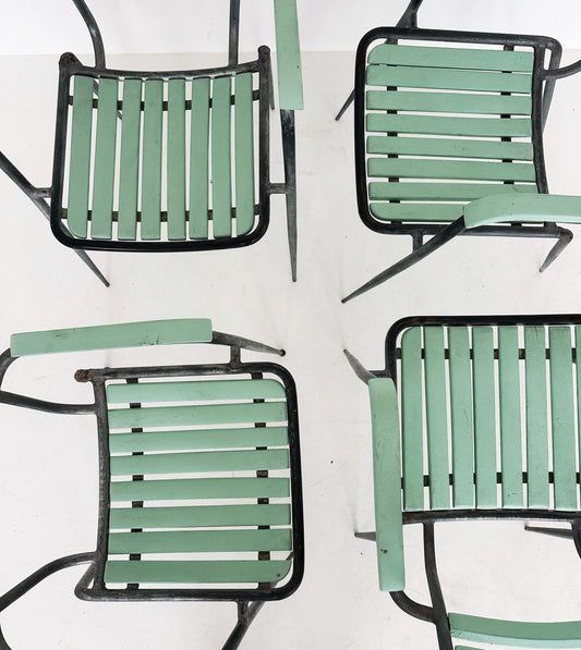 Four wood and metal chairs