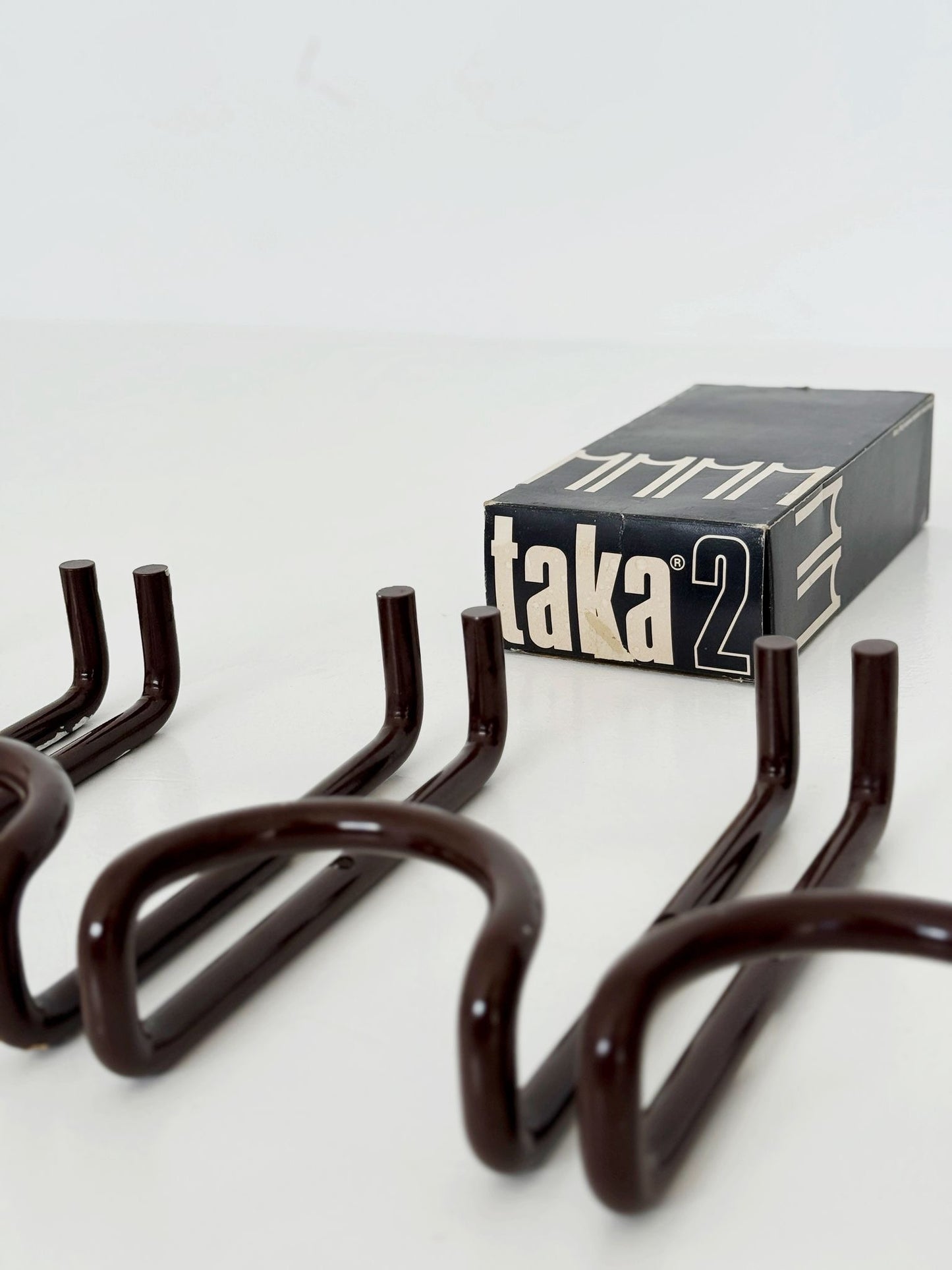 Four Taka hangers, Acerbis