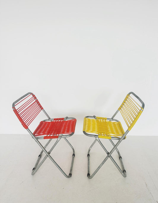 Pair of child cordoned chairs