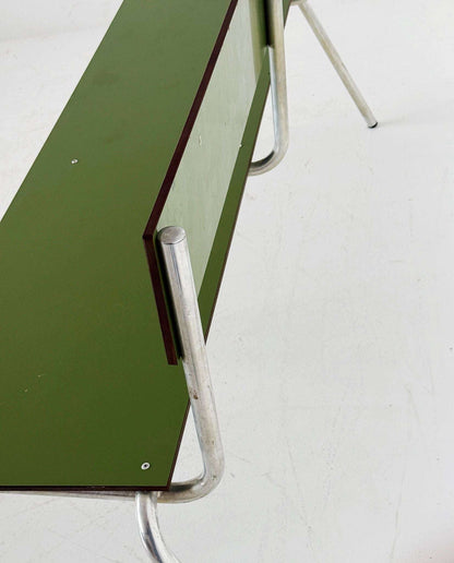 Green metal bench with tubular structure