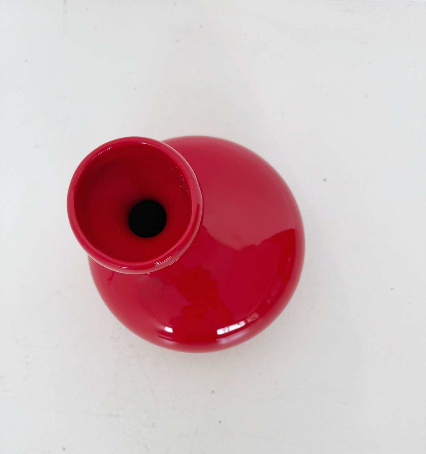 Red ceramic vase