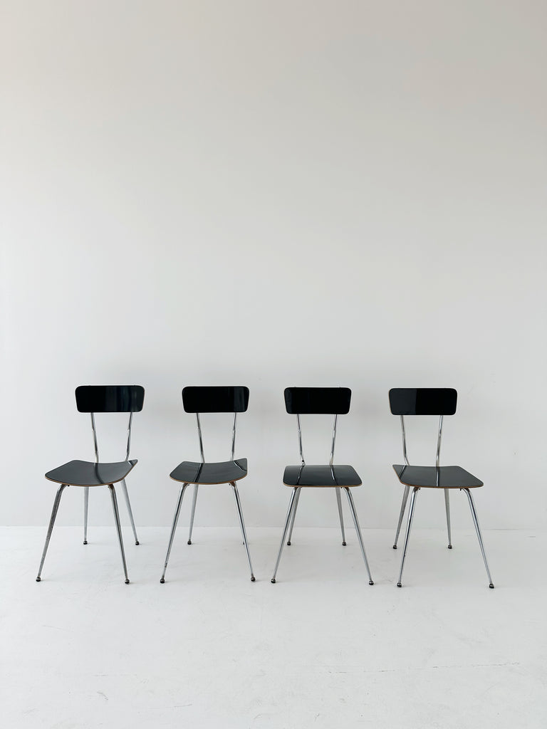 Four formica chairs