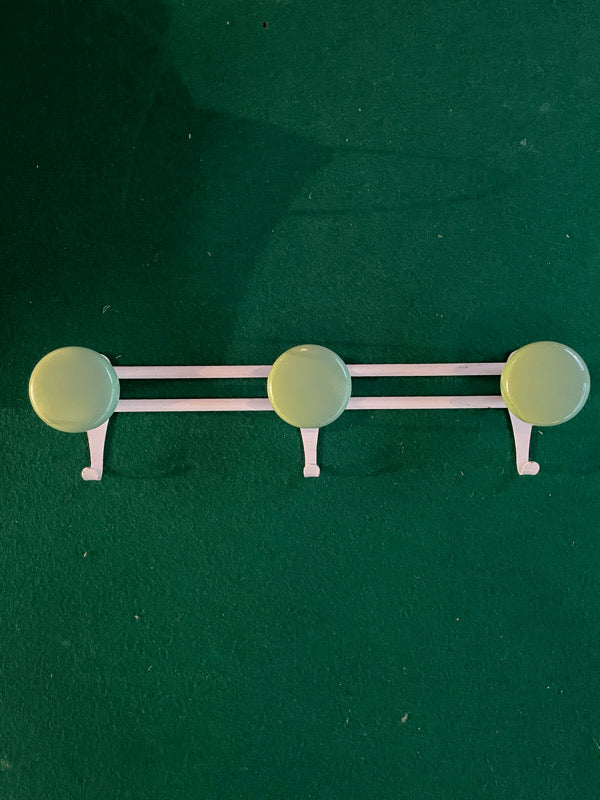 Green and white clothes hanger