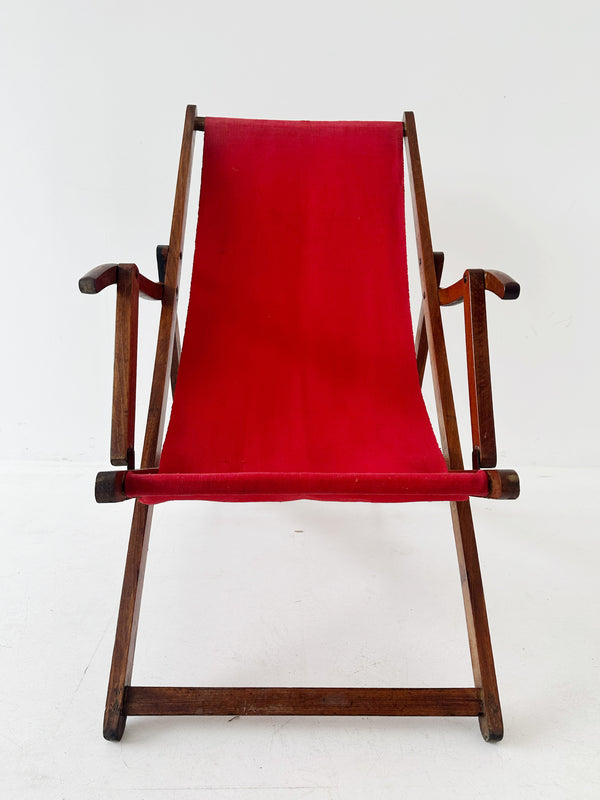 Wooden deckchair with red canvas from the 50s