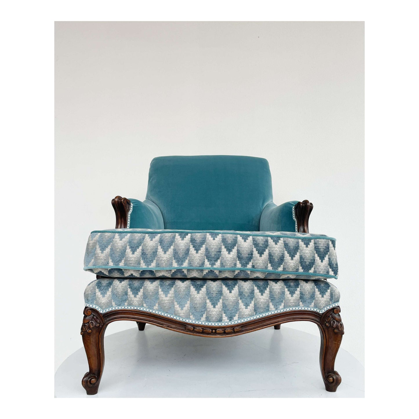 Light blue and wood armchair