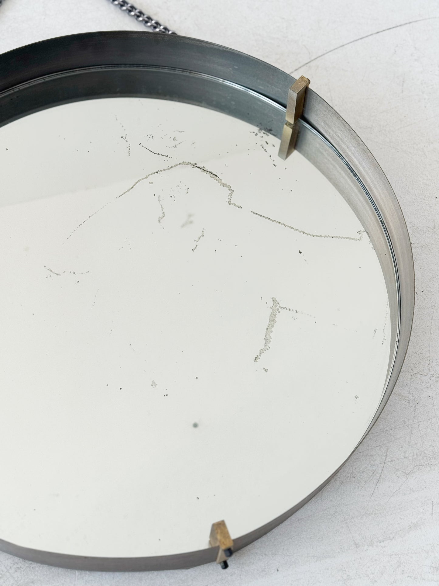 Round mirror with metal frame