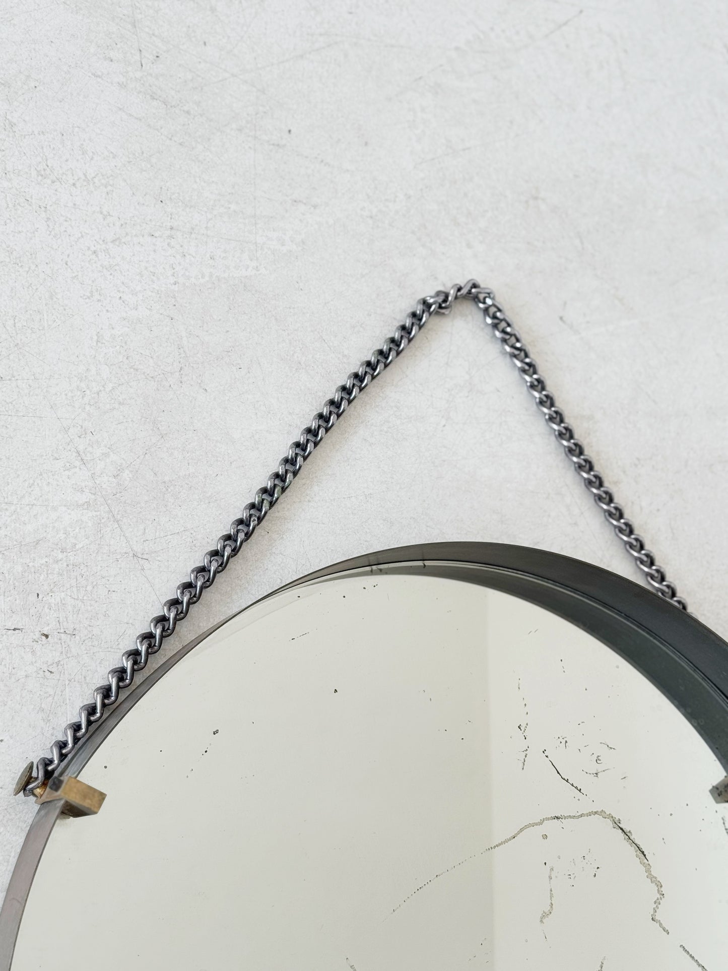 Round mirror with metal frame