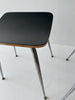 Four formica chairs