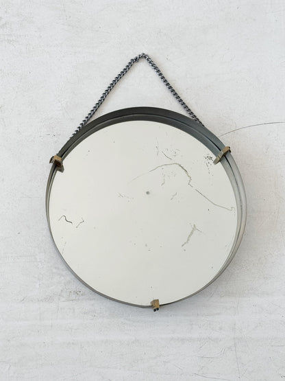 Round mirror with metal frame