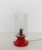 Table lamp with red base