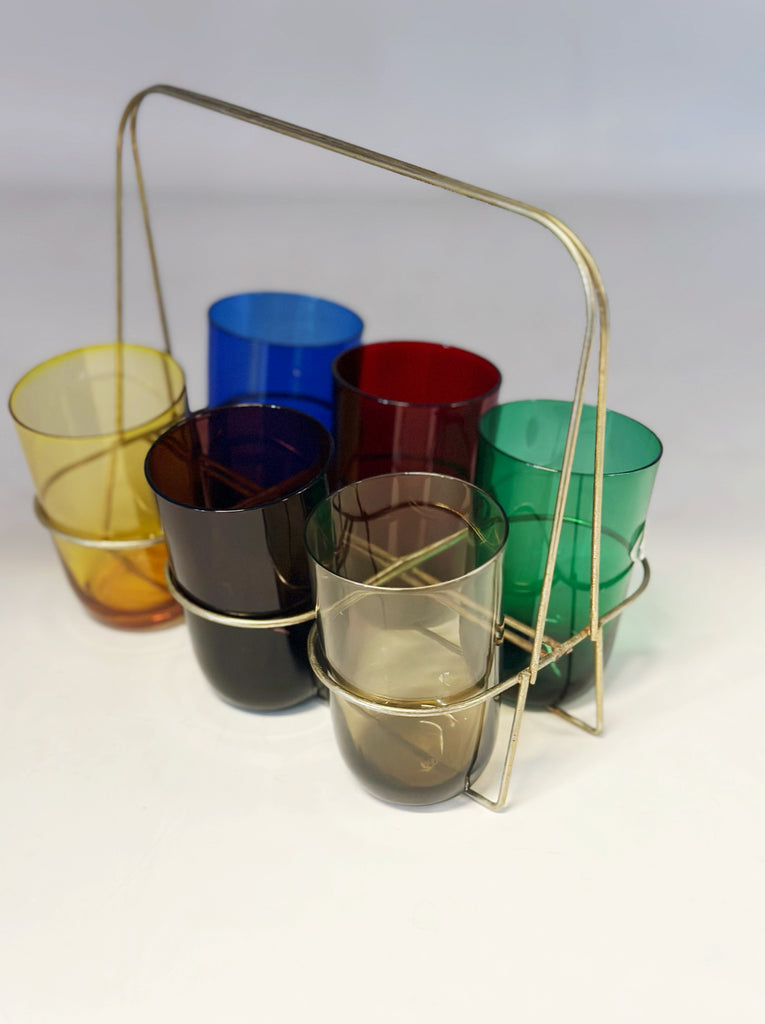 Six colored glasses with cup holders
