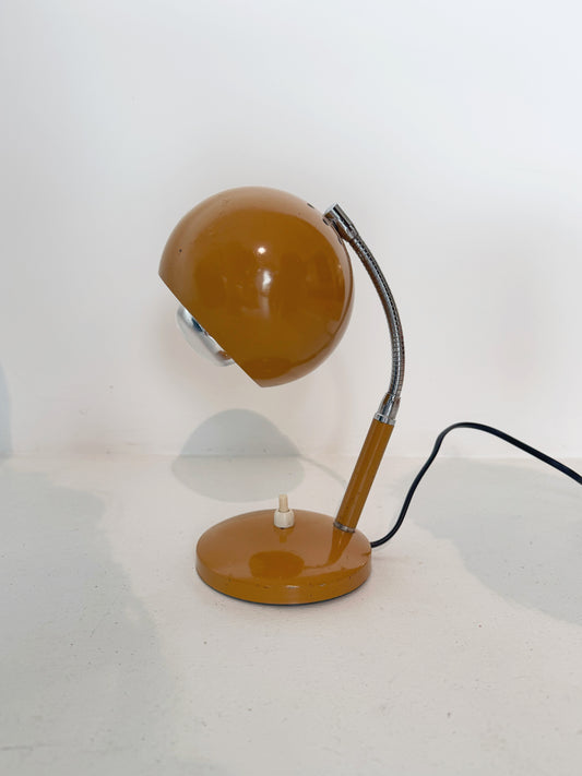 Eye table lamp, mustard color