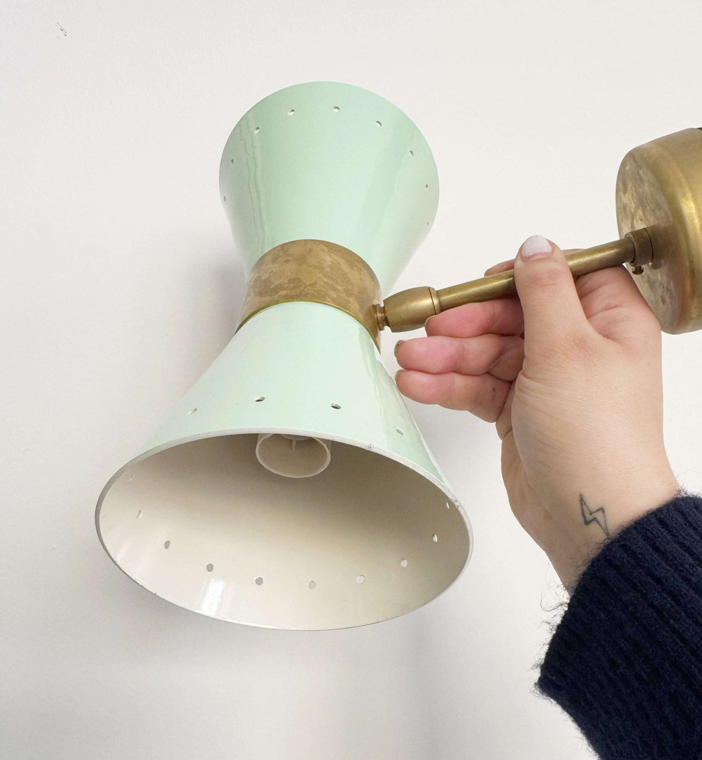 Brass and aluminum applique
