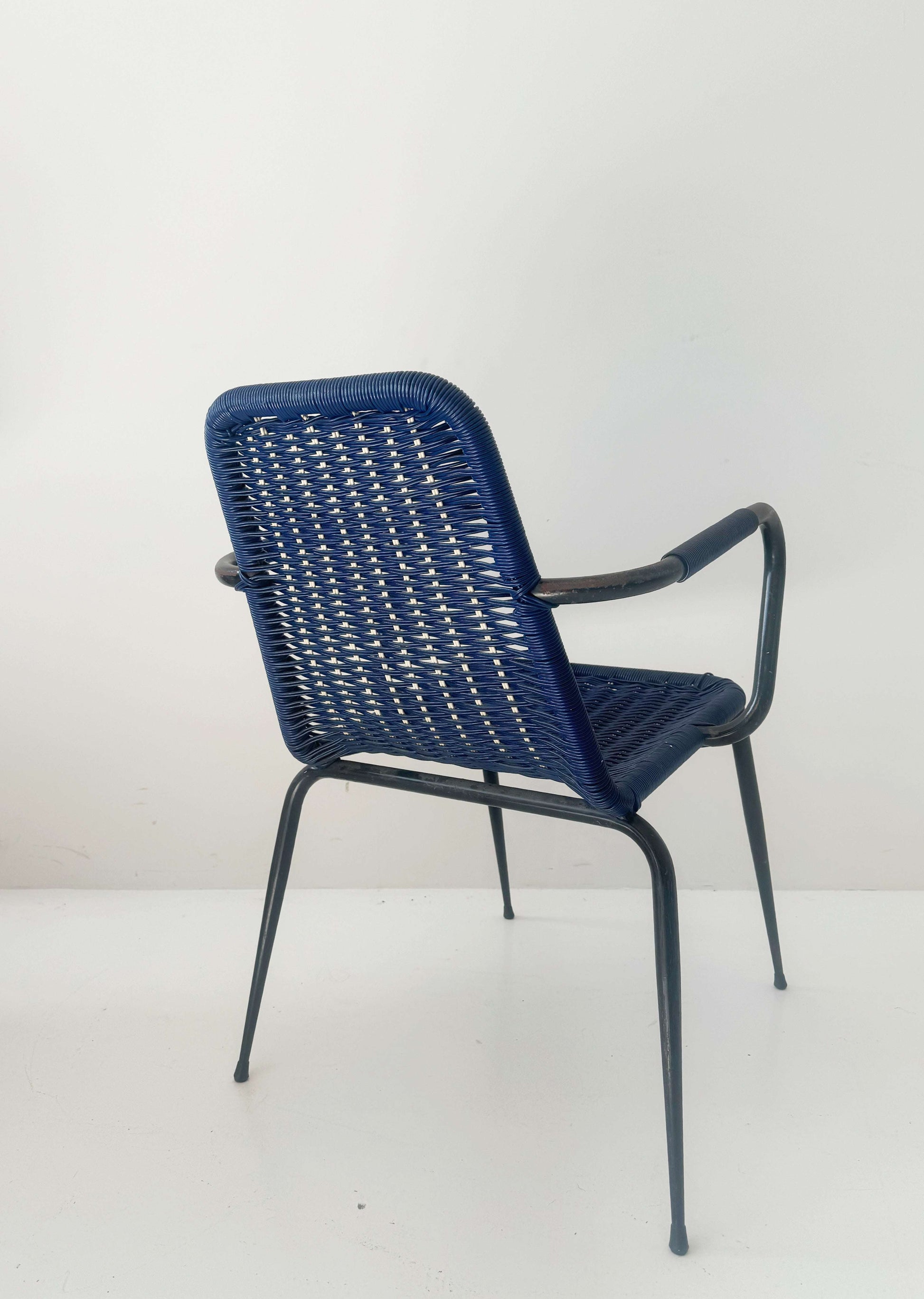 Blue woven chair with armrests