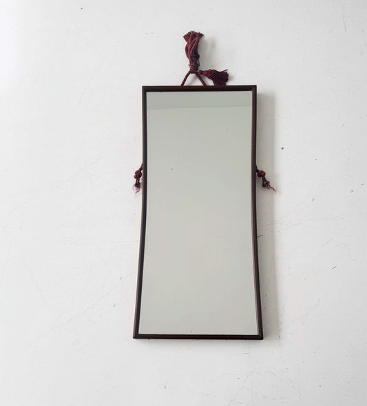 Wall mirror with wooden frame and decorative rope
