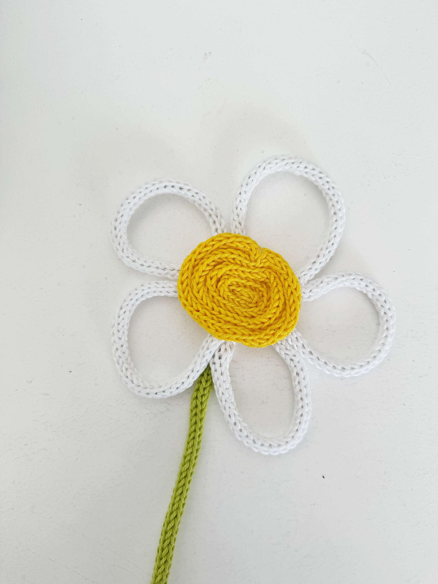 Floral tricotin plant topper – handmade decoration
