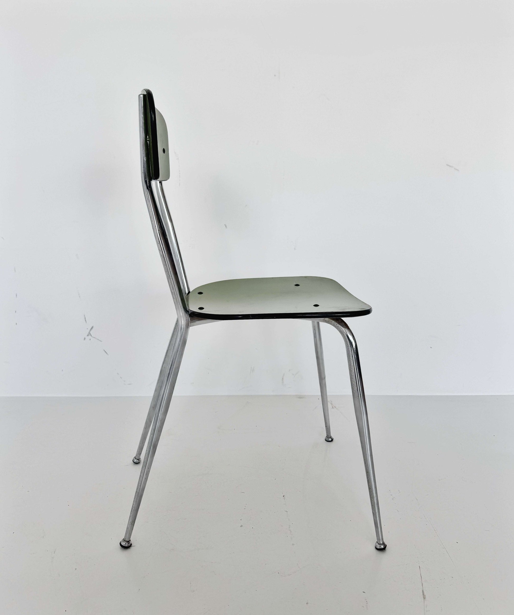 Green formica and metal chair