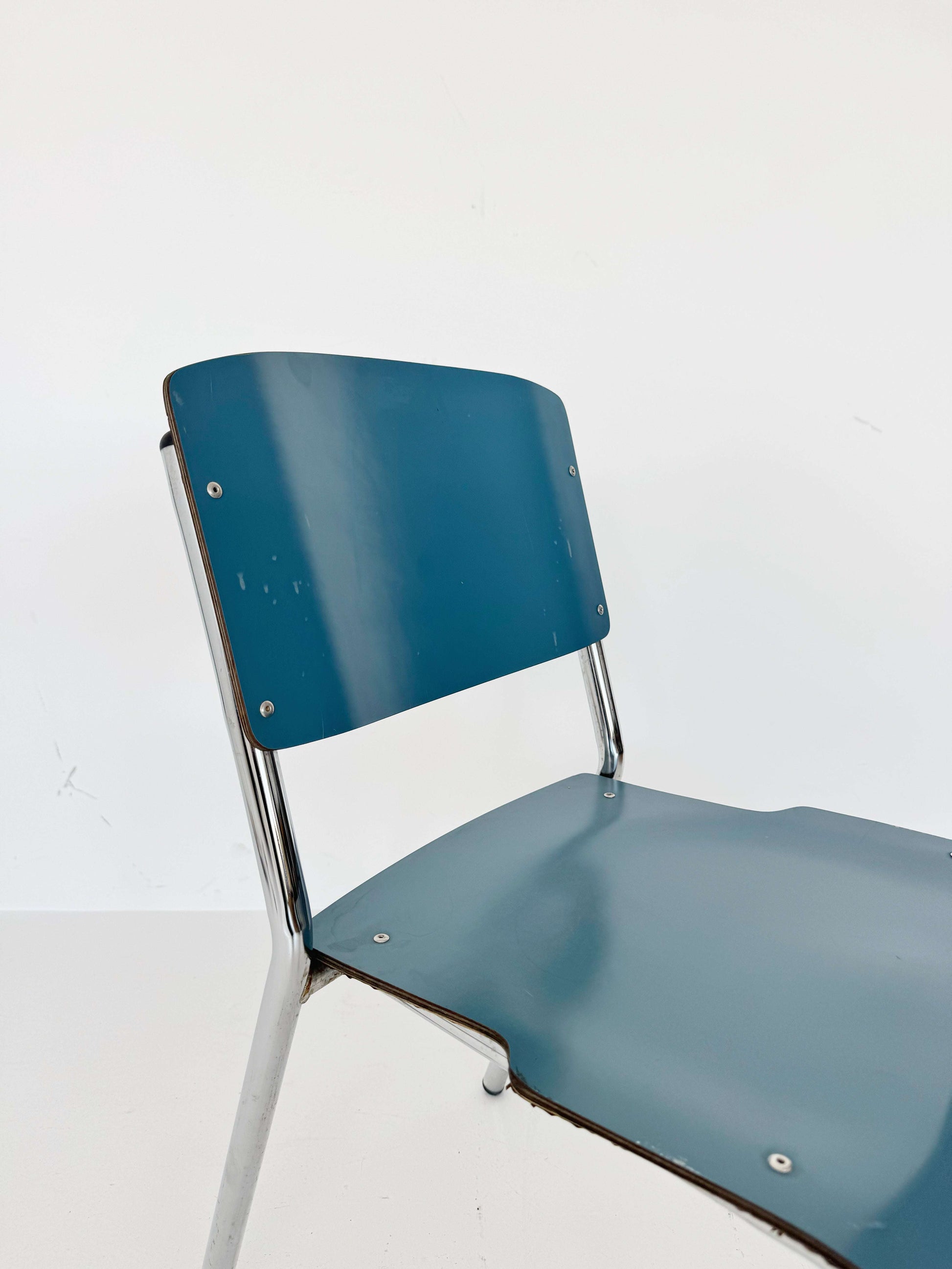 Blue Formica and chrome metal chair
