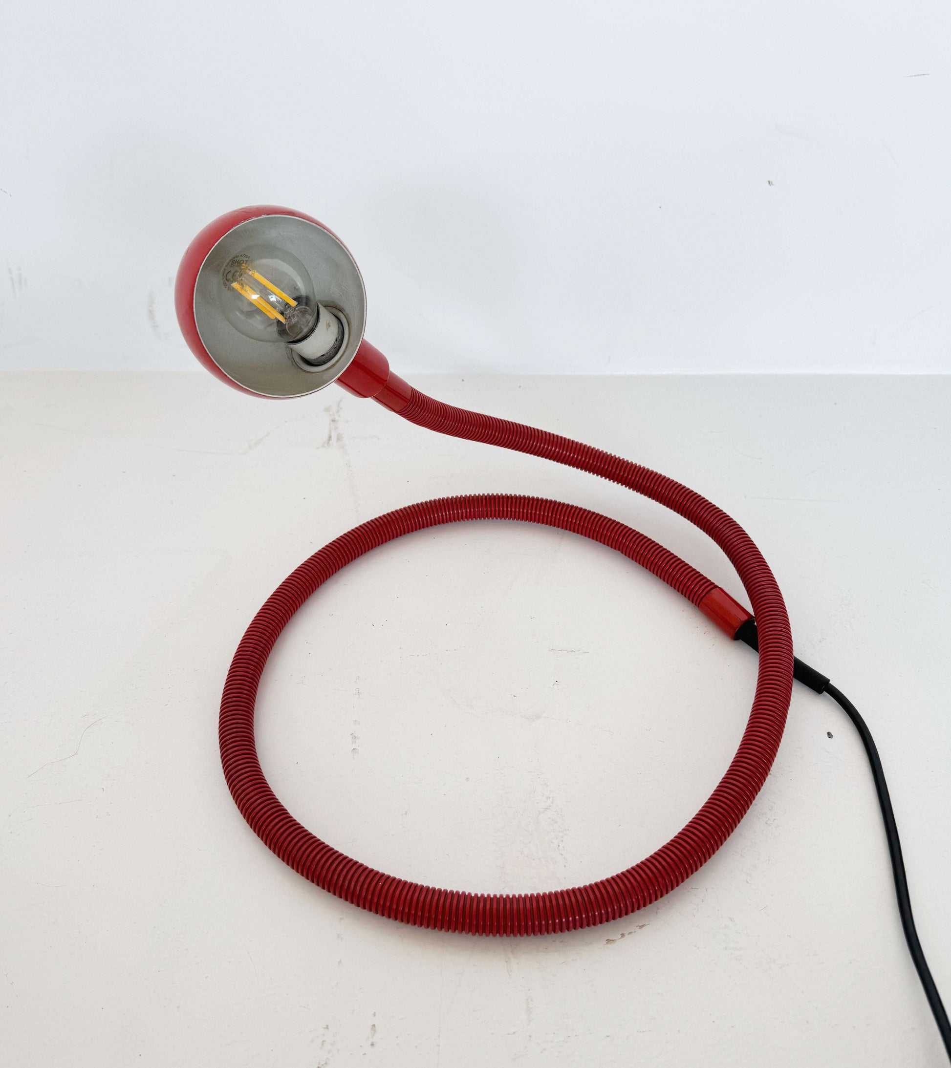 Red adjustable table lamp