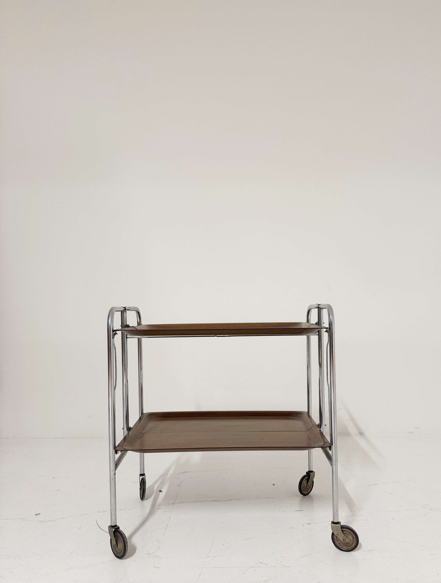 Folding vintage trolley with chrome frame