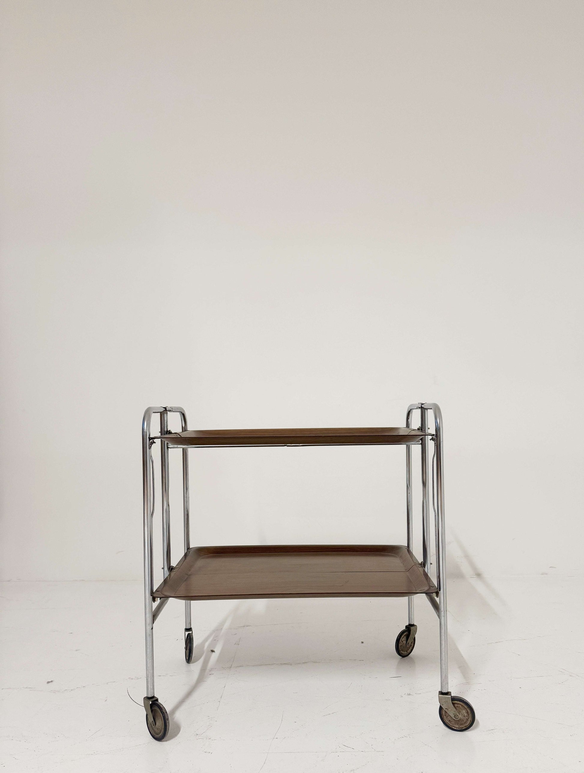 Folding vintage trolley with chrome frame