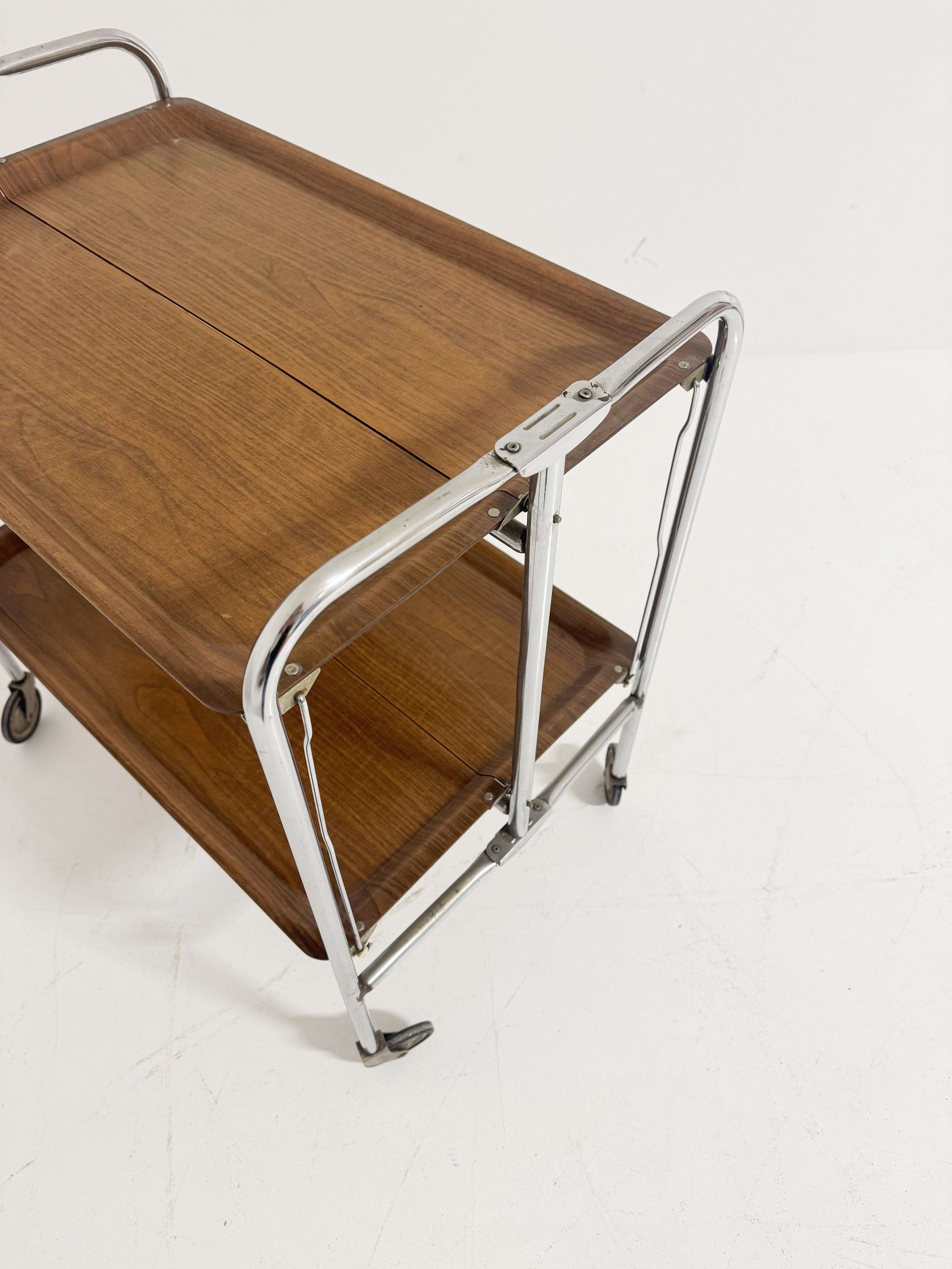 Folding vintage trolley with chrome frame