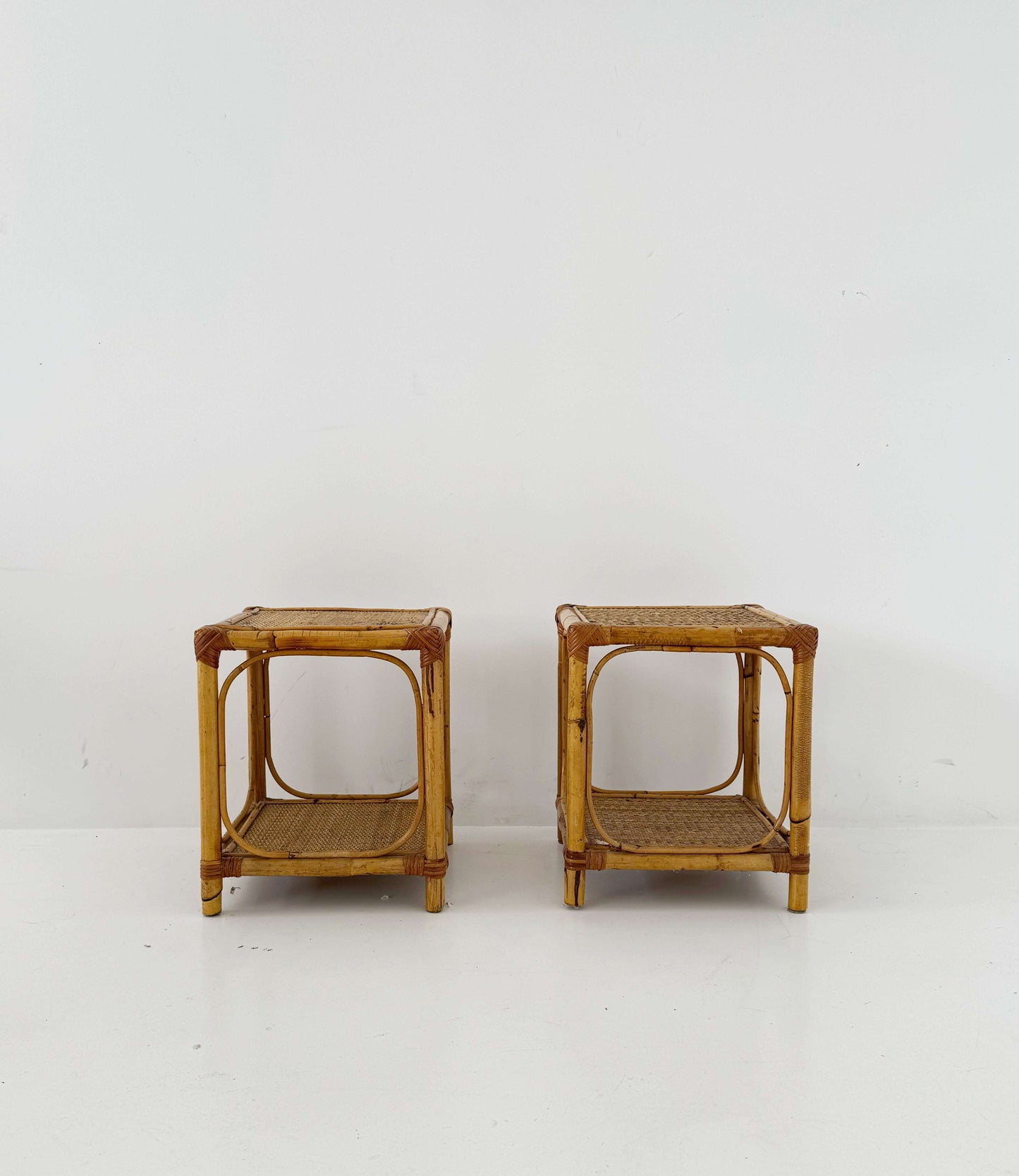 Pair of bamboo and natural woven bedside tables