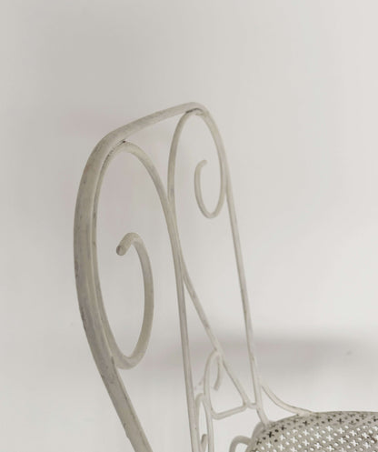 Pair of vintage wrought iron garden chairs