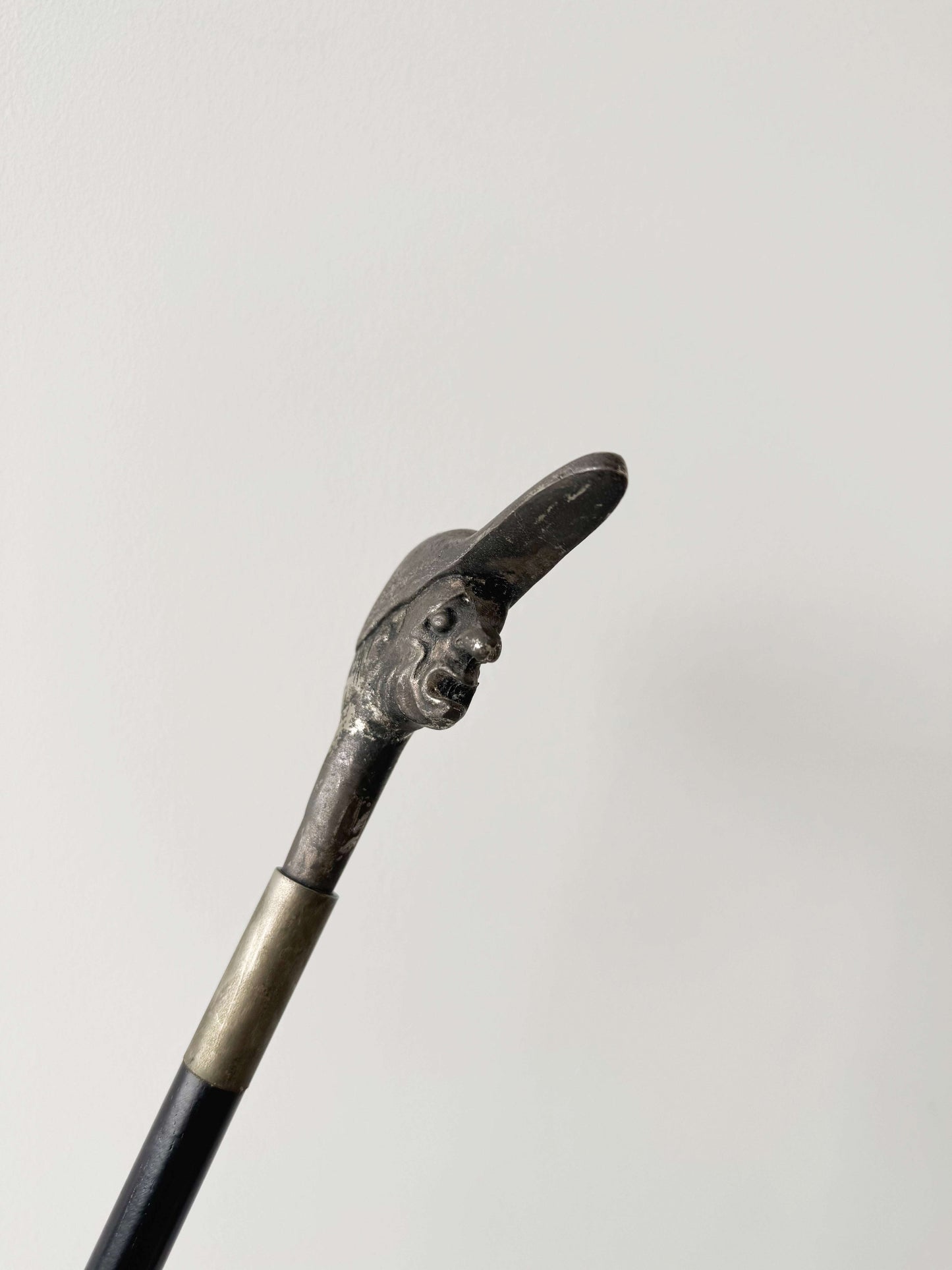 walking stick with caricatured figurative handle (late 19th – early 20th century)