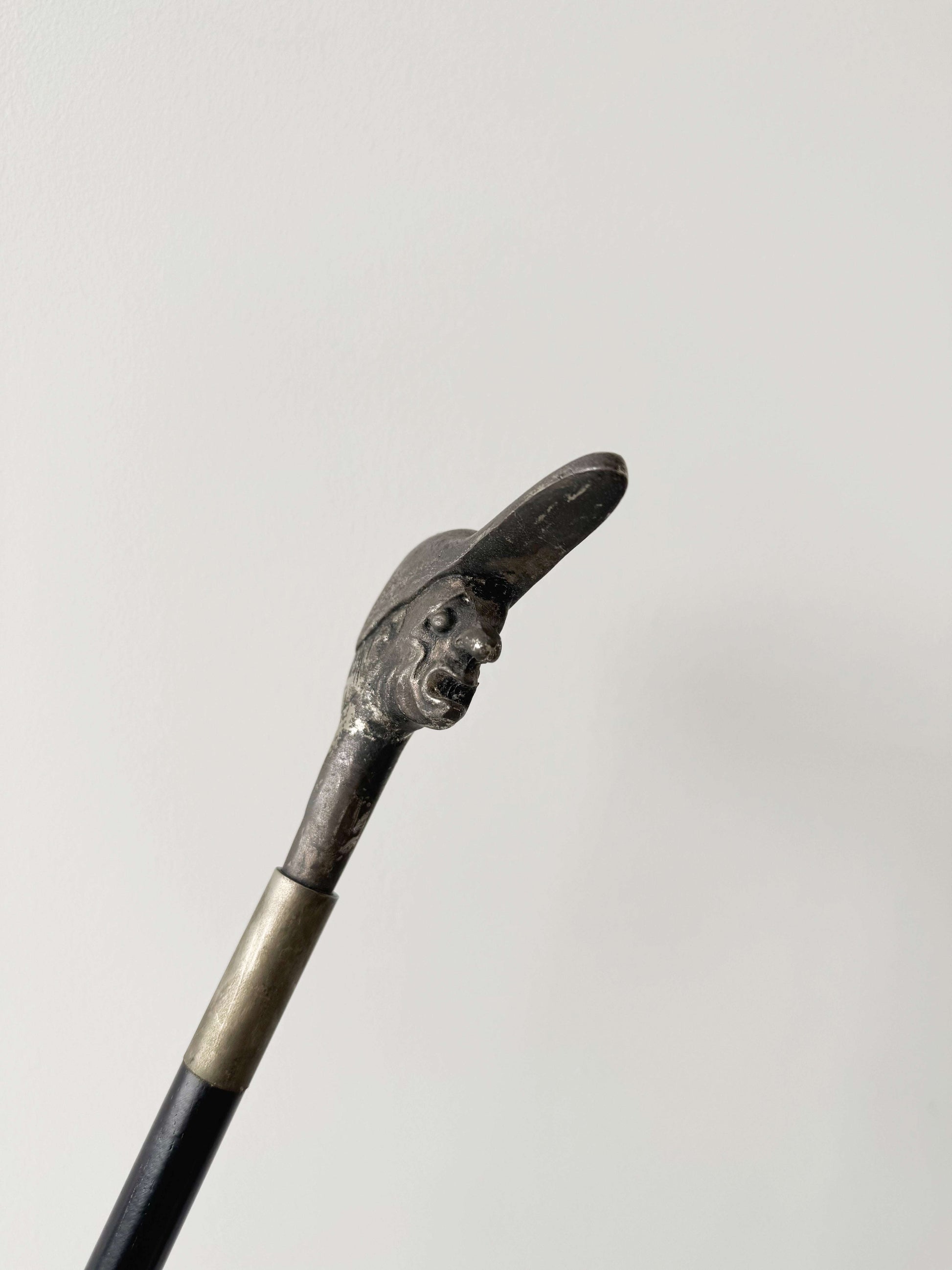 walking stick with caricatured figurative handle (late 19th – early 20th century)