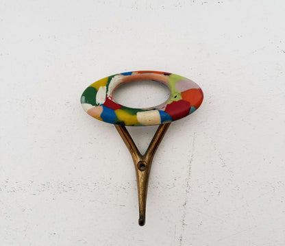 Wall hanger with multicolored ceramic knob