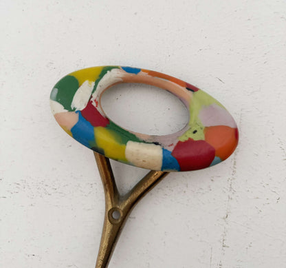 Wall hanger with multicolored ceramic knob