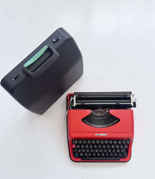 Antares 135 portable typewriter with original case