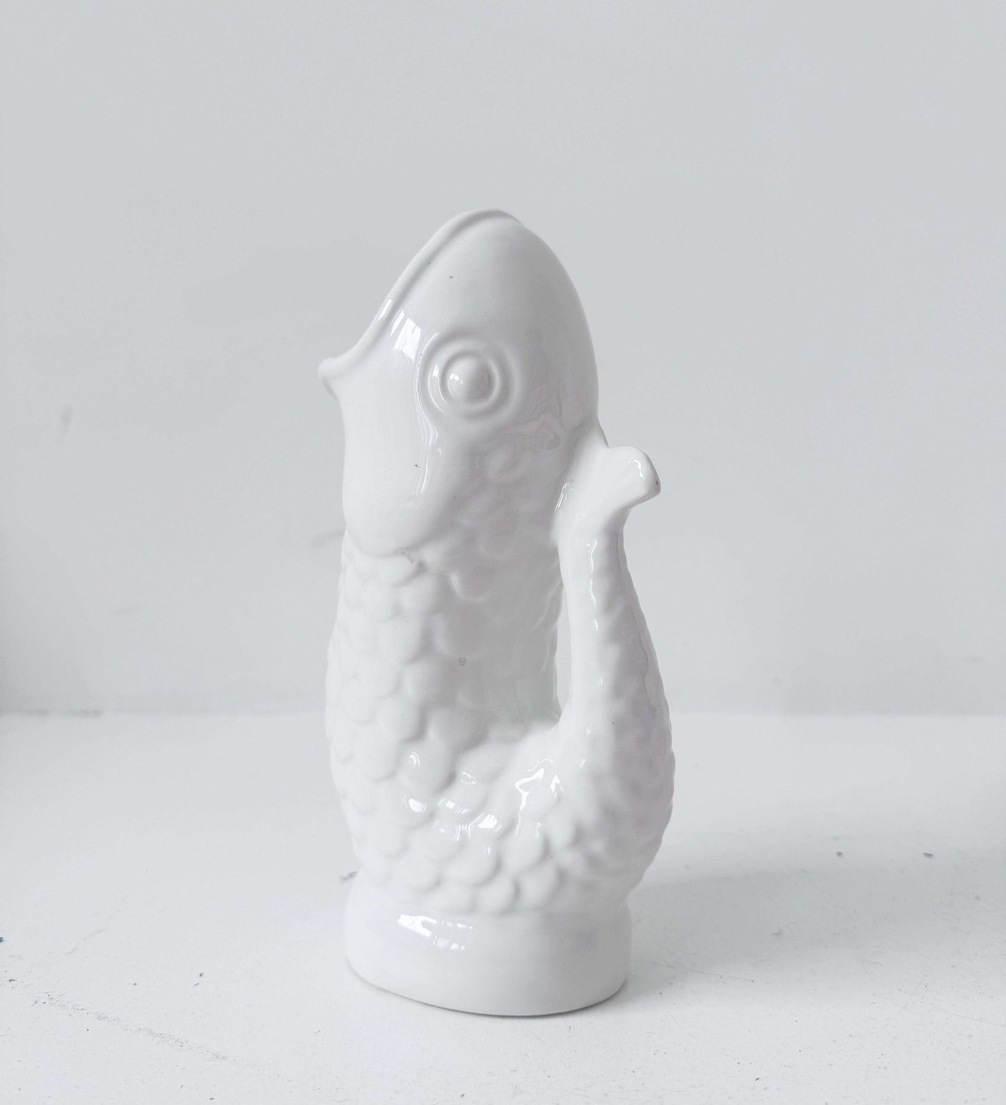 Vintage fish-shaped pitcher signed by Costa – White glazed ceramic