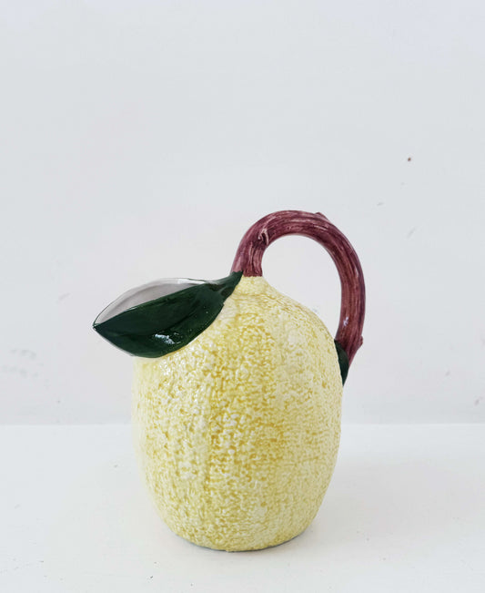 Glazed ceramic lemon-shaped pitcher