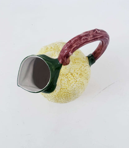 Glazed ceramic lemon-shaped pitcher