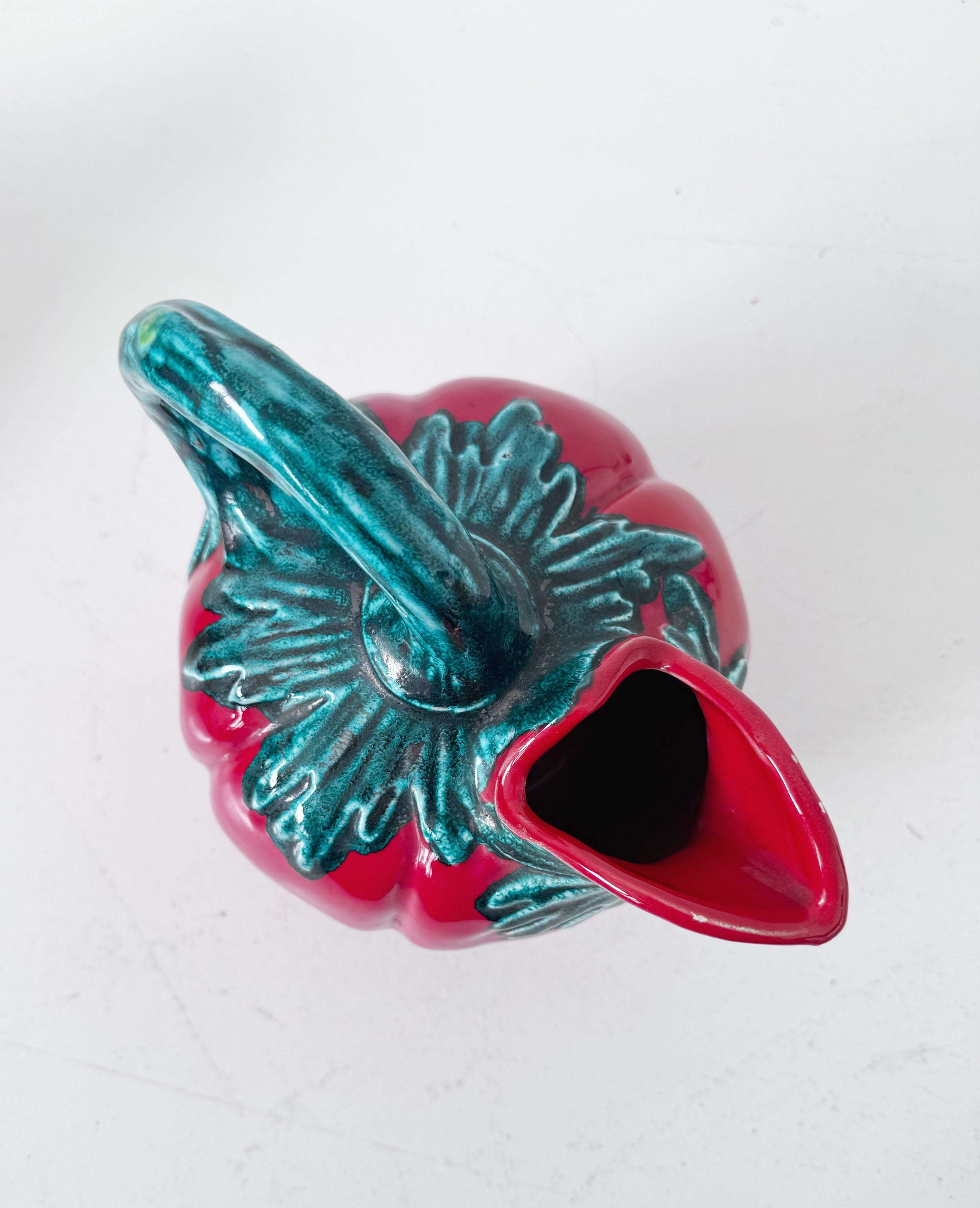 Glazed ceramic tomato-shaped pitcher