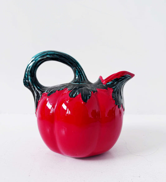 Glazed ceramic tomato-shaped pitcher