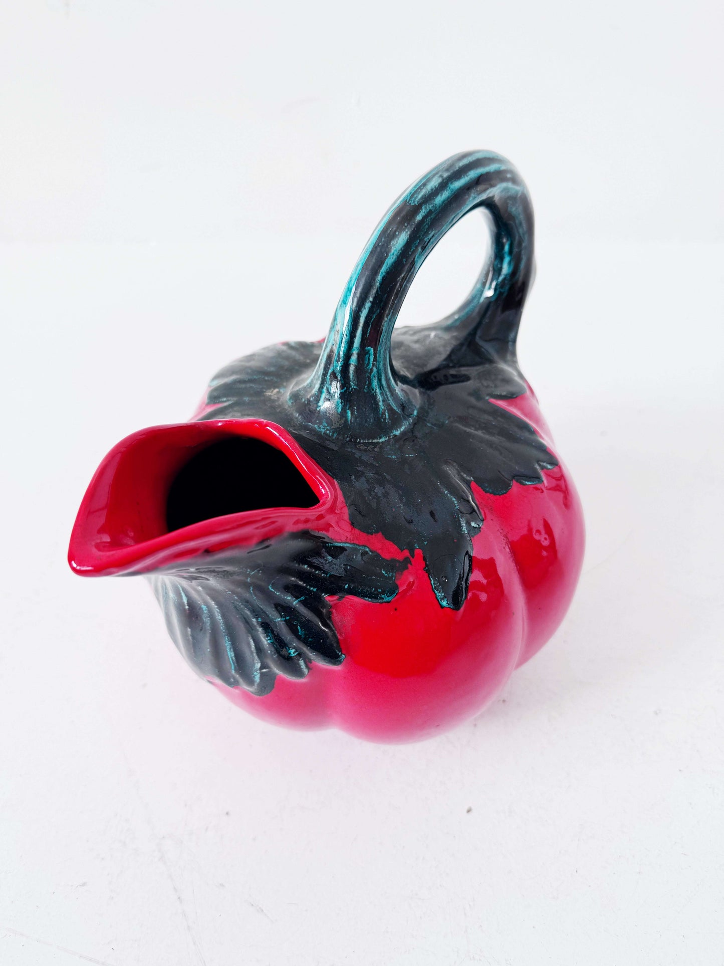 Glazed ceramic tomato-shaped pitcher