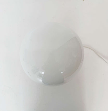 Table lamp with marble base and glass globe