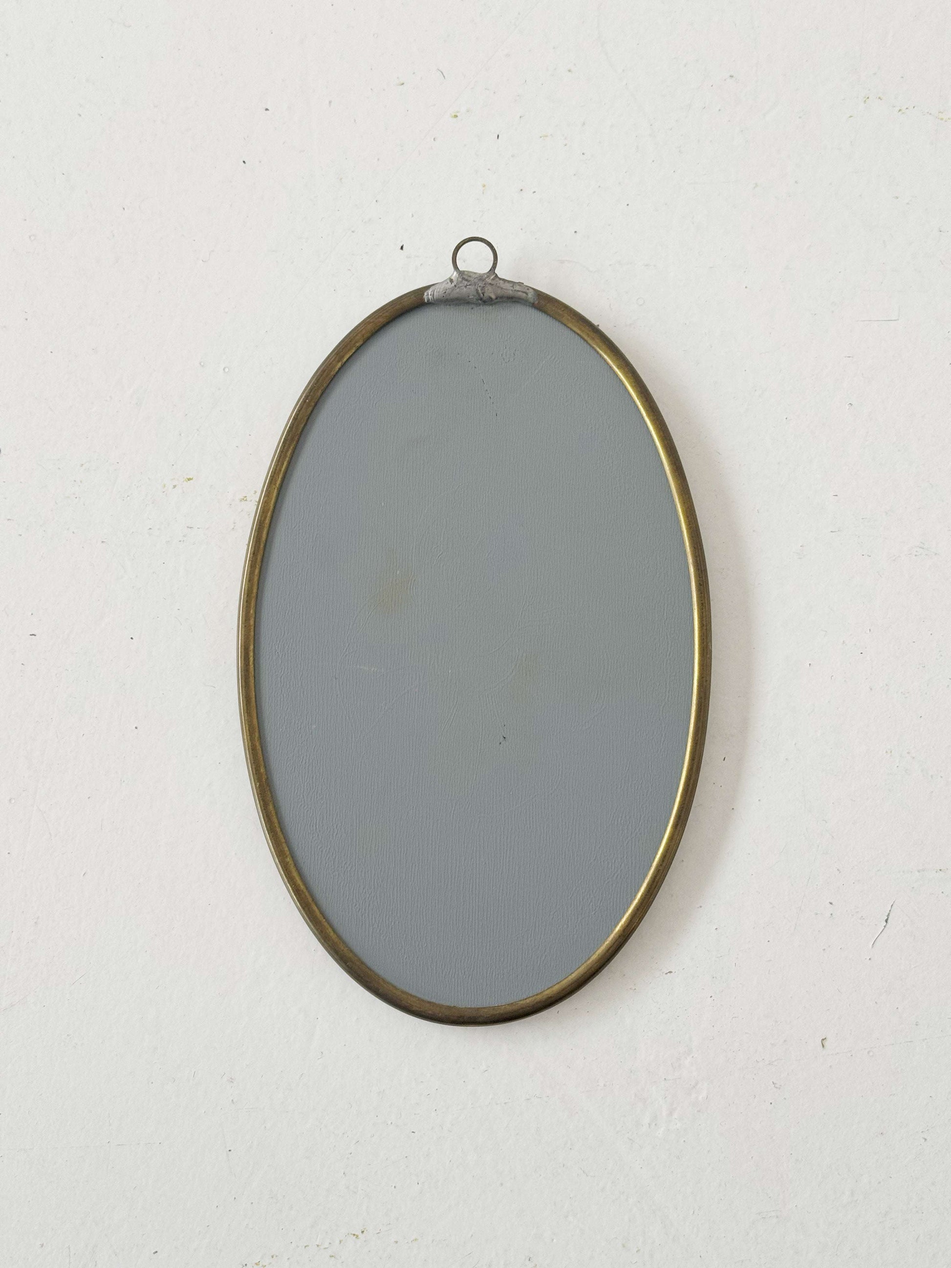 1960s decorated oval wall mirror