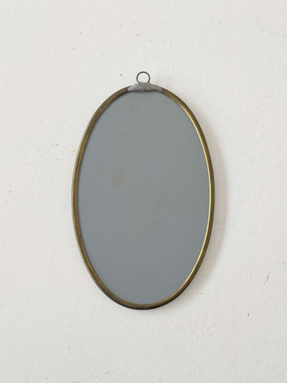 1960s decorated oval wall mirror