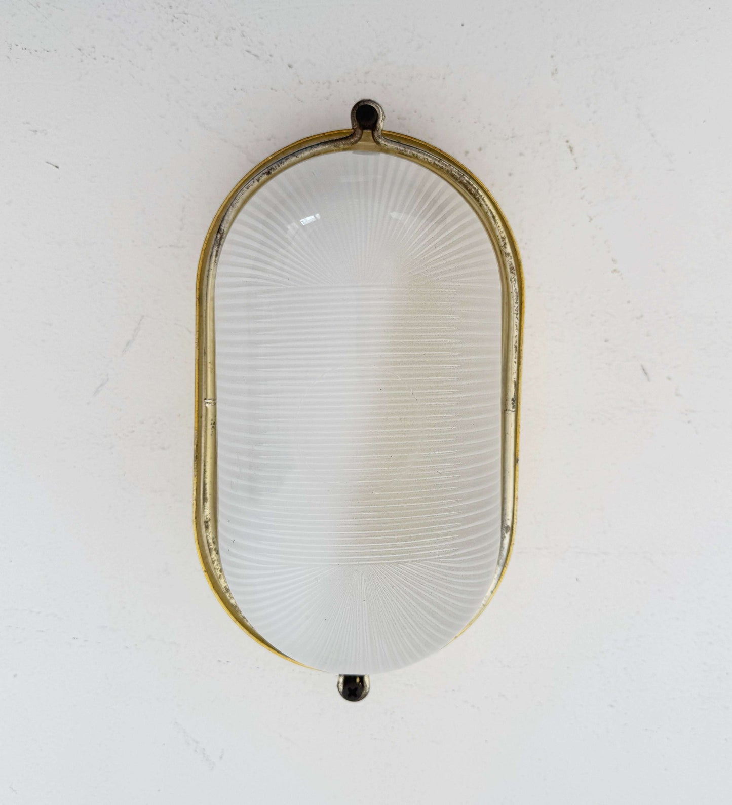 Brass and glass wall light