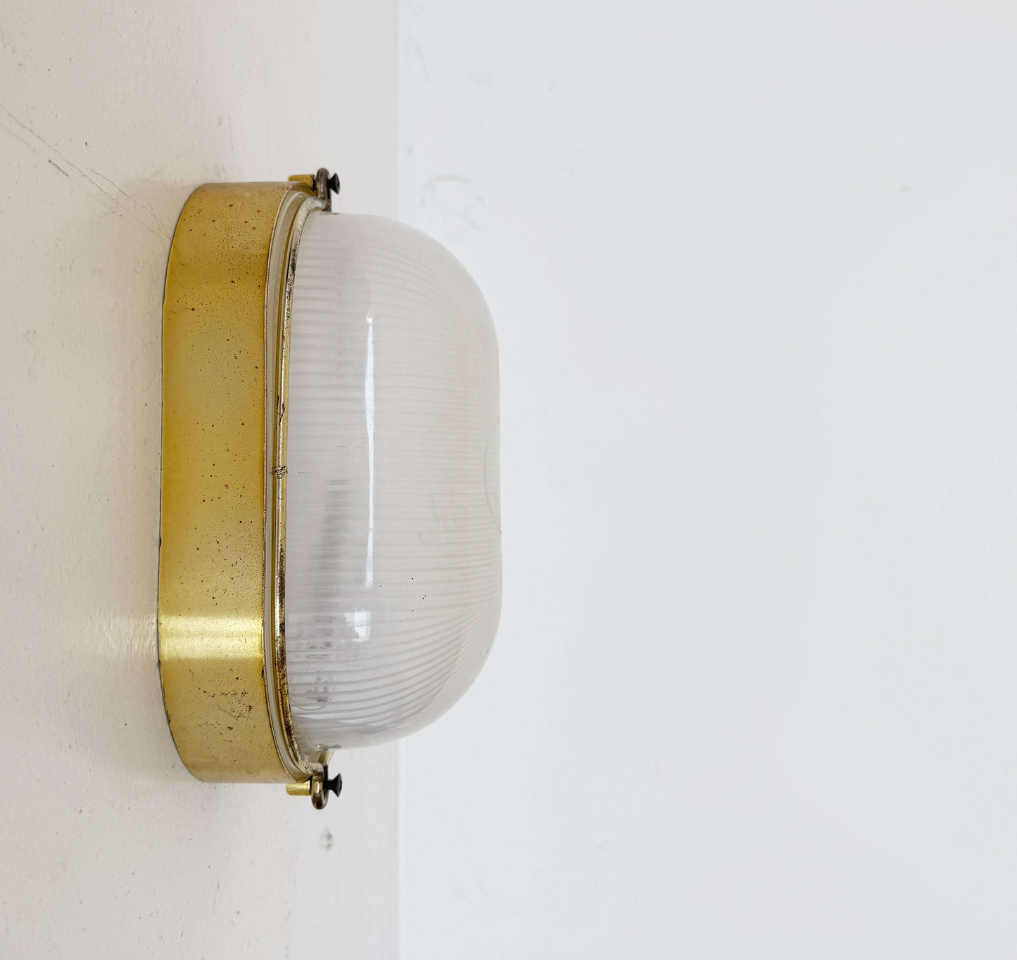 Brass and glass wall light