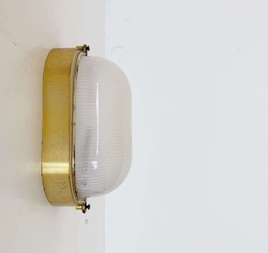 Brass and glass wall light