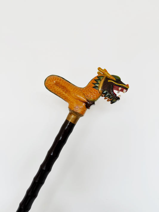 Bastone vintage marrone con drago decorativo