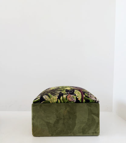 Green pouf with a jungle pattern