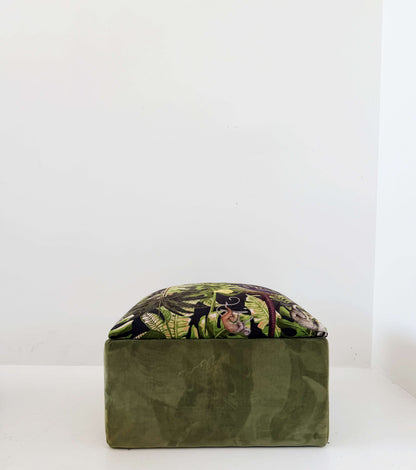 Green pouf with a jungle pattern