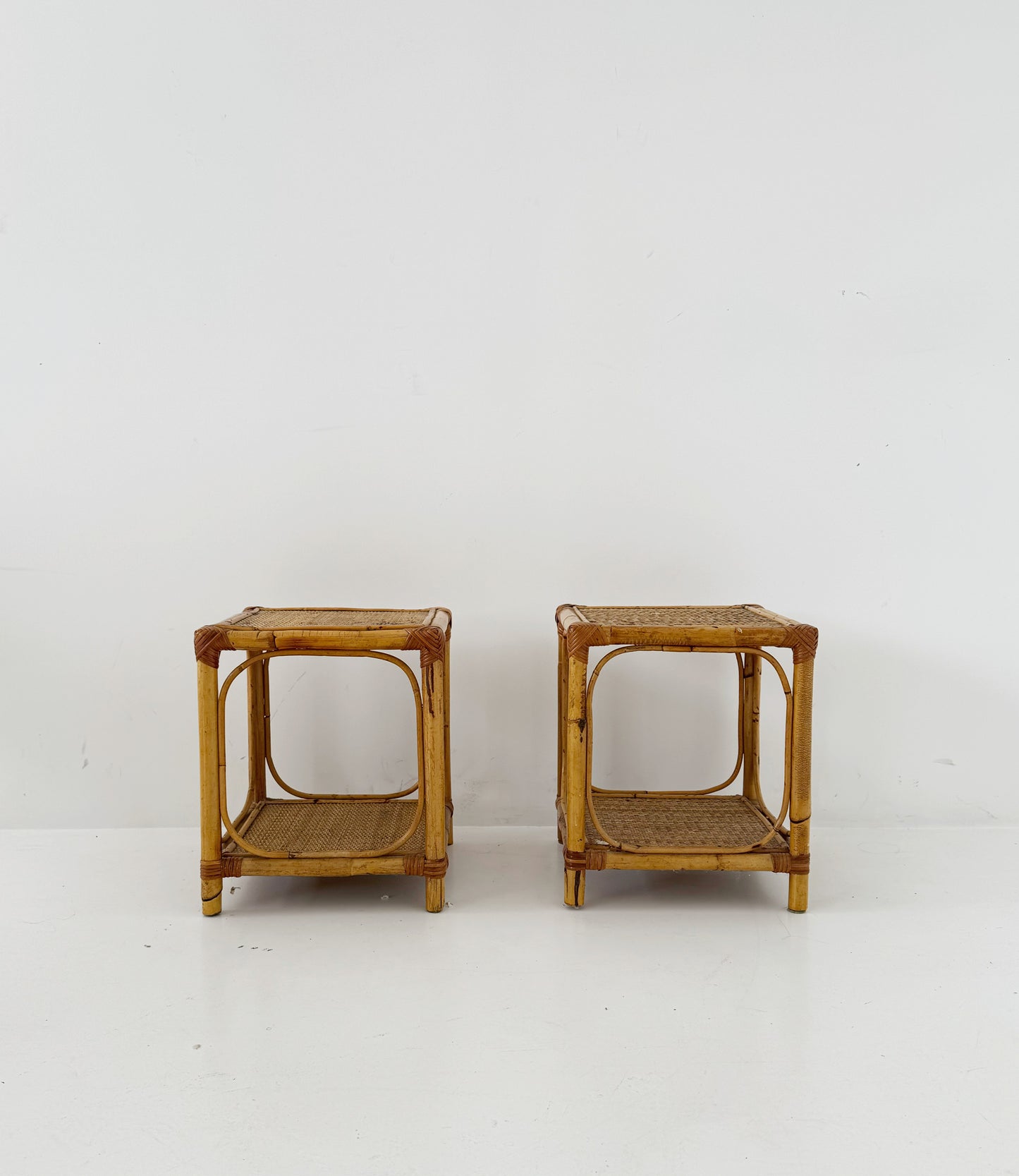 Pair of bamboo and natural woven bedside tables