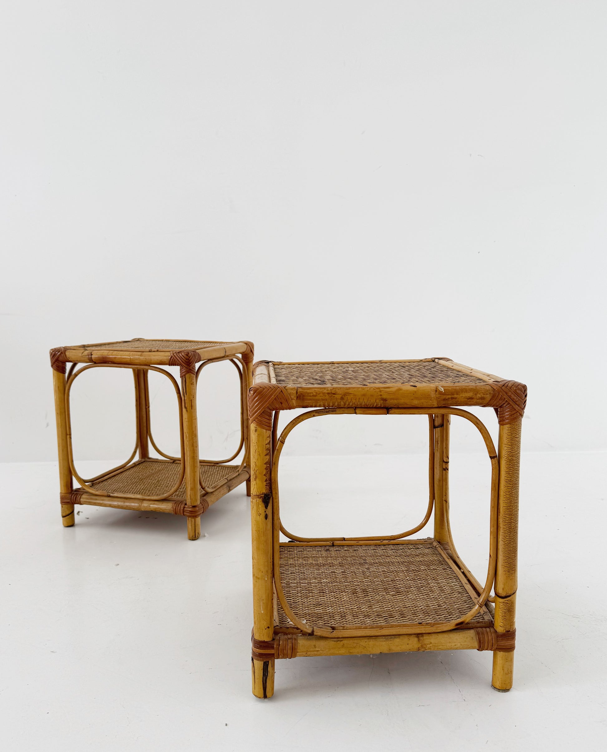 Pair of bamboo and natural woven bedside tables